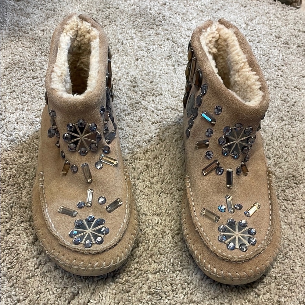 Tory Burch Tan moccasin boots with Sparkling Embellishments.